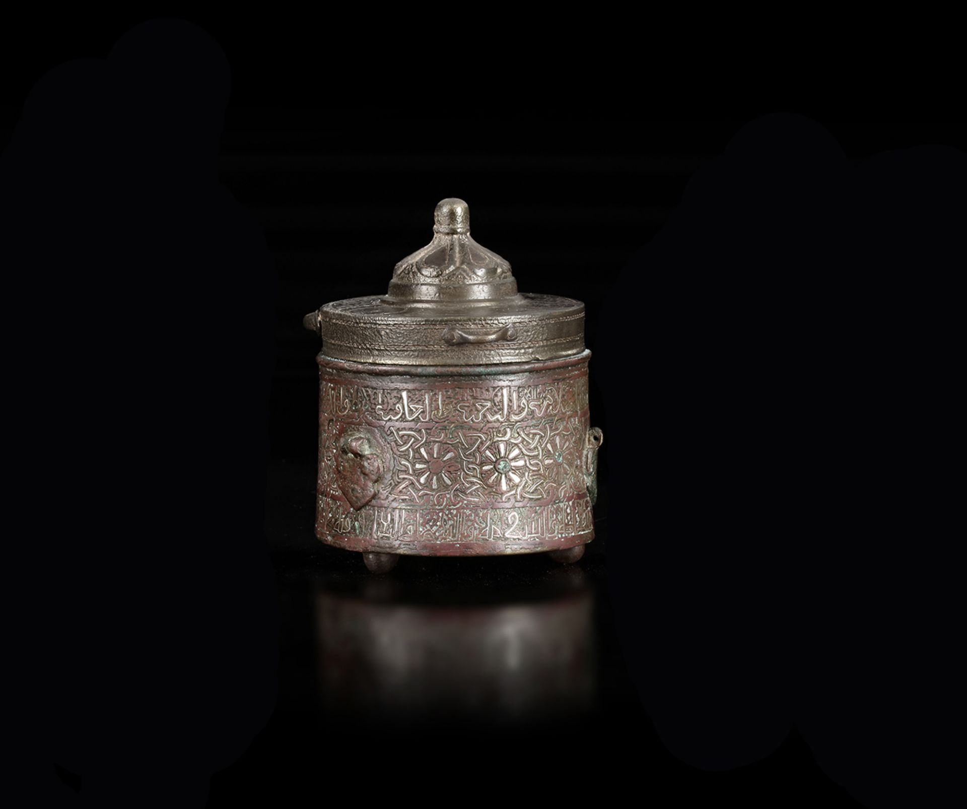 A KHURASAN SILVER- INLAID BRONZE INKWELL, 12TH-13TH CENTURY