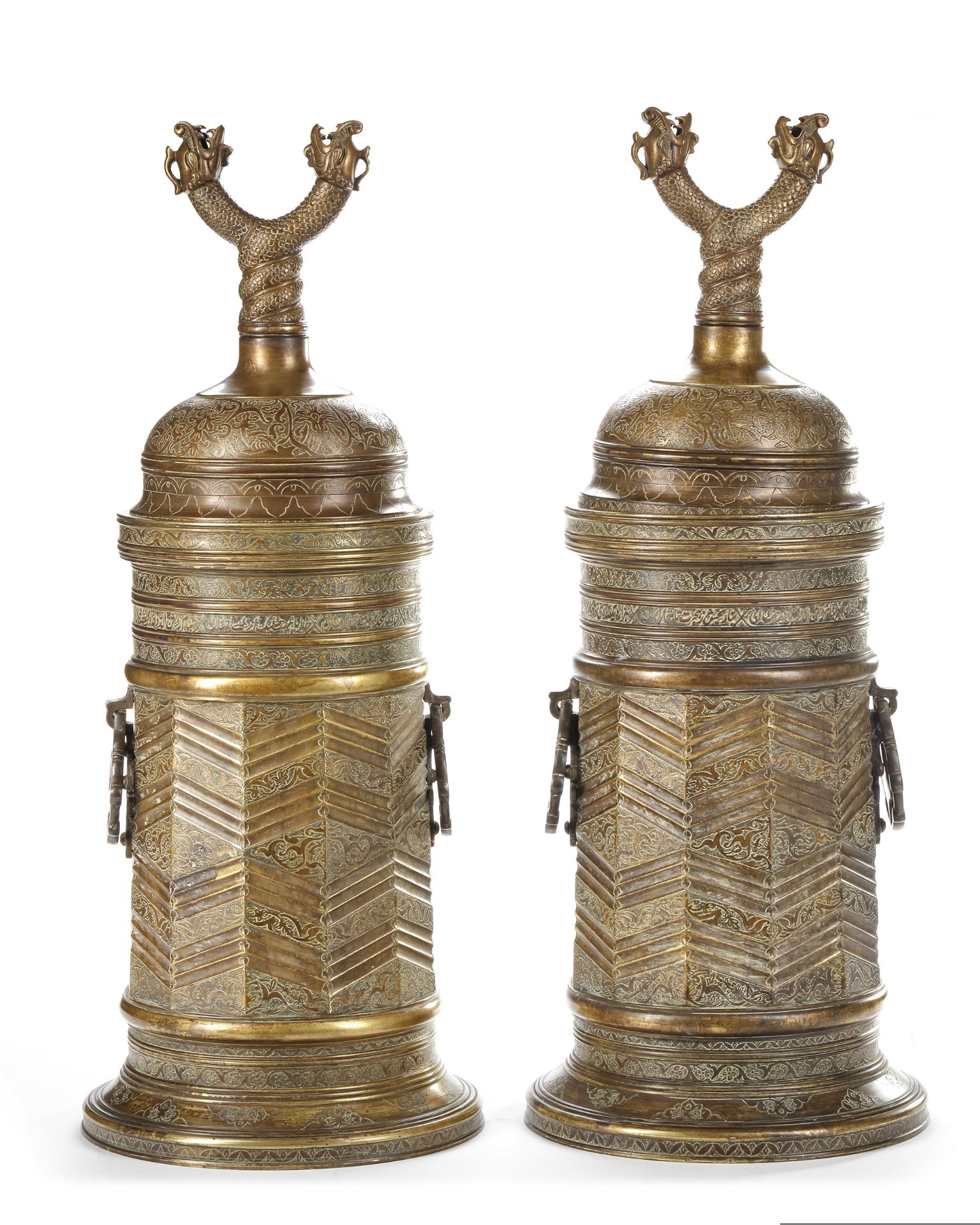 A PAIR OF LARGE SAFAVID STYLE ENGRAVED BRASS TORCH STANDS, PERSIA, 18TH-19TH CENTURY