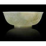 A CHINESE CARVED JADE BOWL, 18TH CENTURY