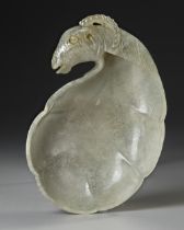 A CHINESE RAM HEAD JADE BRUSH WASHER, QING DYNASTY (1644-1911)