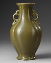 A CHINESE TEADUST-GLAZED TWIN-HANDLED VASE, 19TH CENTURY