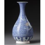 A CHINESE BLUE AND WHITE DRAGON VASE, QING DYNASTY (1644–1911)