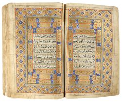 A KASHMIR LEATHER-BOUND QURAN, WRITTEN BY MUHAMMED SAIF AL-ALLAH AL-ANSARI AL-LAHORI, DATED 1248 AH/