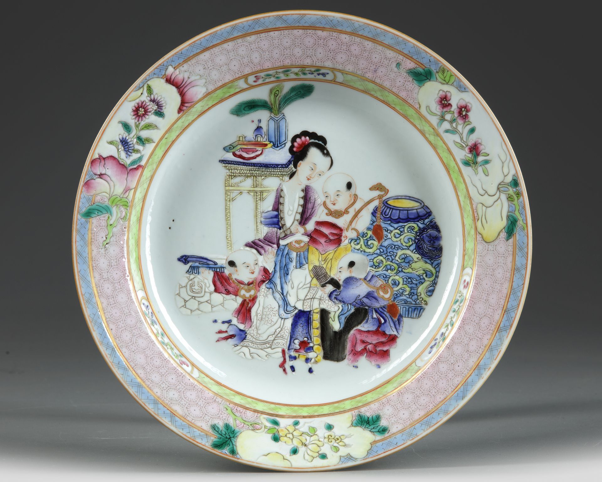 A CHINESE FAMILLE ROSE 'LADY & BOYS' DISH, 20TH CENTURY