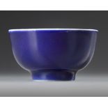A CHINESE BLUE-GLAZED CUP, 19TH CENTURY