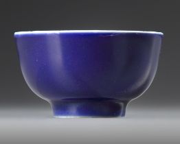 A CHINESE BLUE-GLAZED CUP, 19TH CENTURY