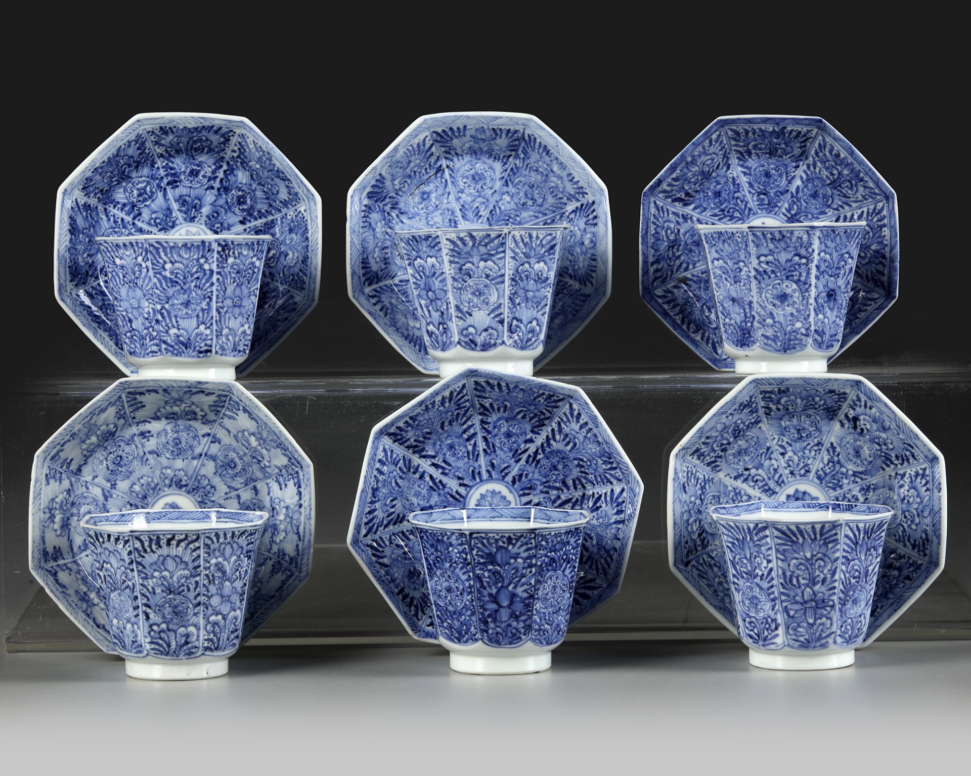 A SET OF SIX BLUE AND WHITE CUPS AND SAUCERS, KANGXI PERIOD (1662-1722)