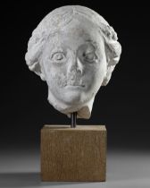 A MARBLE FEMALE HEAD, 17TH-18TH CENTURY