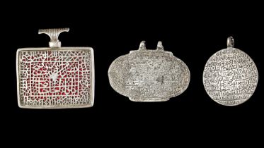 THREE TALISMANIC SILVER PENDANTS