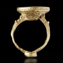 A GOLD SEAL RING