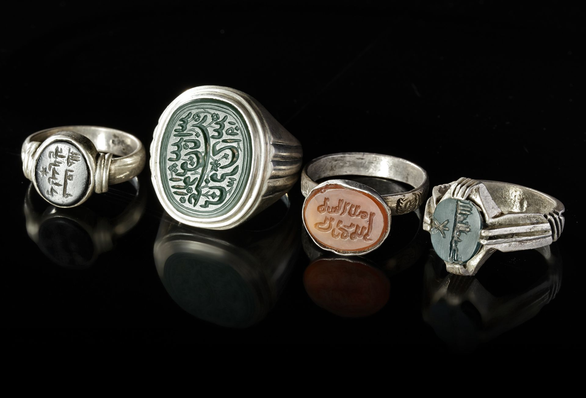 FOUR AGATE SEAL SILVER RINGS