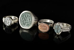 FOUR AGATE SEAL SILVER RINGS