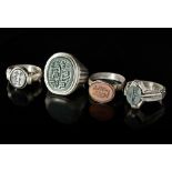 FOUR AGATE SEAL SILVER RINGS