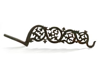 A BYZANTINE BRONZE BRACKET FOR A HANGING LAMP OR POLYCANDELON, 5TH-7TH CENTURY AD