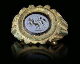 A LATE ROMAN GILDED BRONZE RING, CIRCA LATE 3RD OR EARLY 4TH CENTURY A.D.