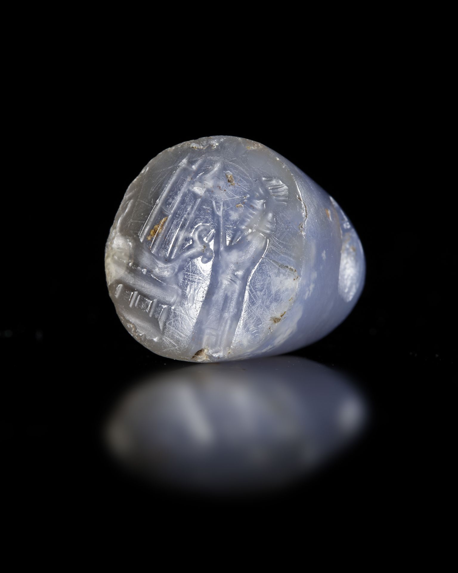 A BLUE CHALCEDONY NEO ASSYRIAN STAMP SEAL, 7TH-8TH CENTURY BC