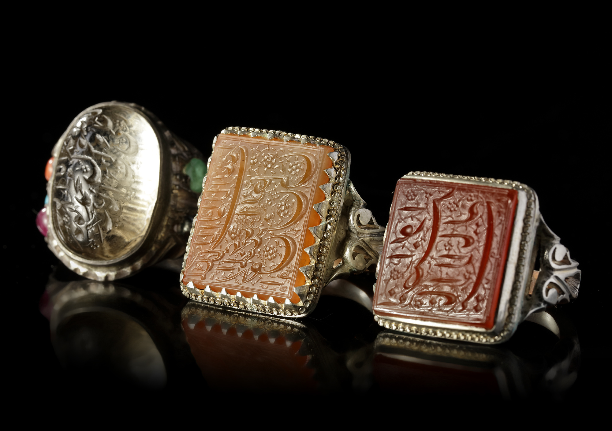 THREE AGATE AND CRYSTAL SILVER RINGS