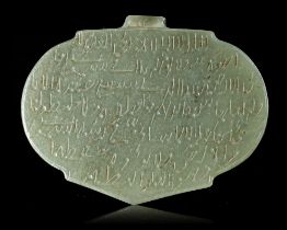 A TIMURID CARVED JADE TALIMANIC PENDANT