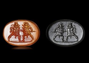 A ROMAN INTAGLIO WITH TWO GLADIATORS, 1ST CENTURY AD