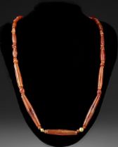 A CARNELIAN NECKLACE, NEAR EASTERN, 3RD MILLENNIUM BC