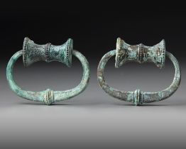 TWO GREEK BRONZE SITULA HANDLES, HELLENISTIC, 3RD-4TH CENTURY BC