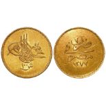 A 100 Kurush gold coin