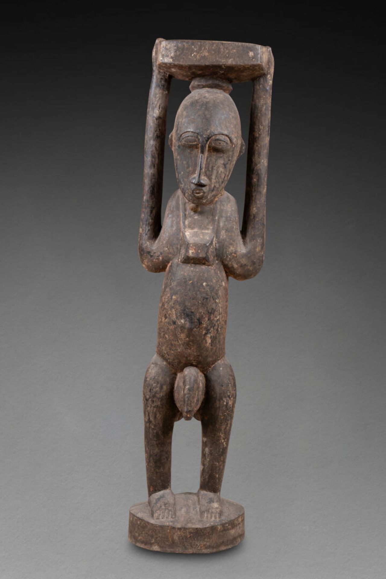 Deux figures de style Senoufo Bois sculpté et patiné Côte d'Ivoire H. 40 et 91 cm