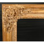 John Davies Framing. A Reproduction Carved Giltwood Louis XIV Style Frame, with centres and corners,