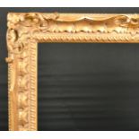 John Davies Framing. A Reproduction Carved Giltwood Chippendale Style Frame, with swept and