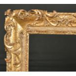 John Davies Framing. A Reproduction Carved Giltwood Hugenot Louis XIV Style Frame, with swept and