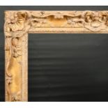 John Davies Framing. A Reproduction Carved Giltwood Louis XIV Style Frame, with swept and pierced