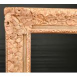 John Davies Framing. A Reproduction Carved Giltwood Louis XIV Style Frame, with swept centres and