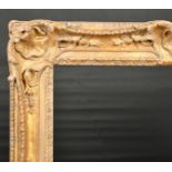 John Davies Framing. A Reproduction Carved Giltwood Louis XIV Style Frame, with swept centres and