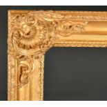 John Davies Framing. A Reproduction Carved Giltwood Louis XIV Style Frame, rebate 55.5" x 40" (141 x