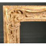 18th Century French School. A Carved Giltwood Louis XV Frame, with swept and pierced centres and