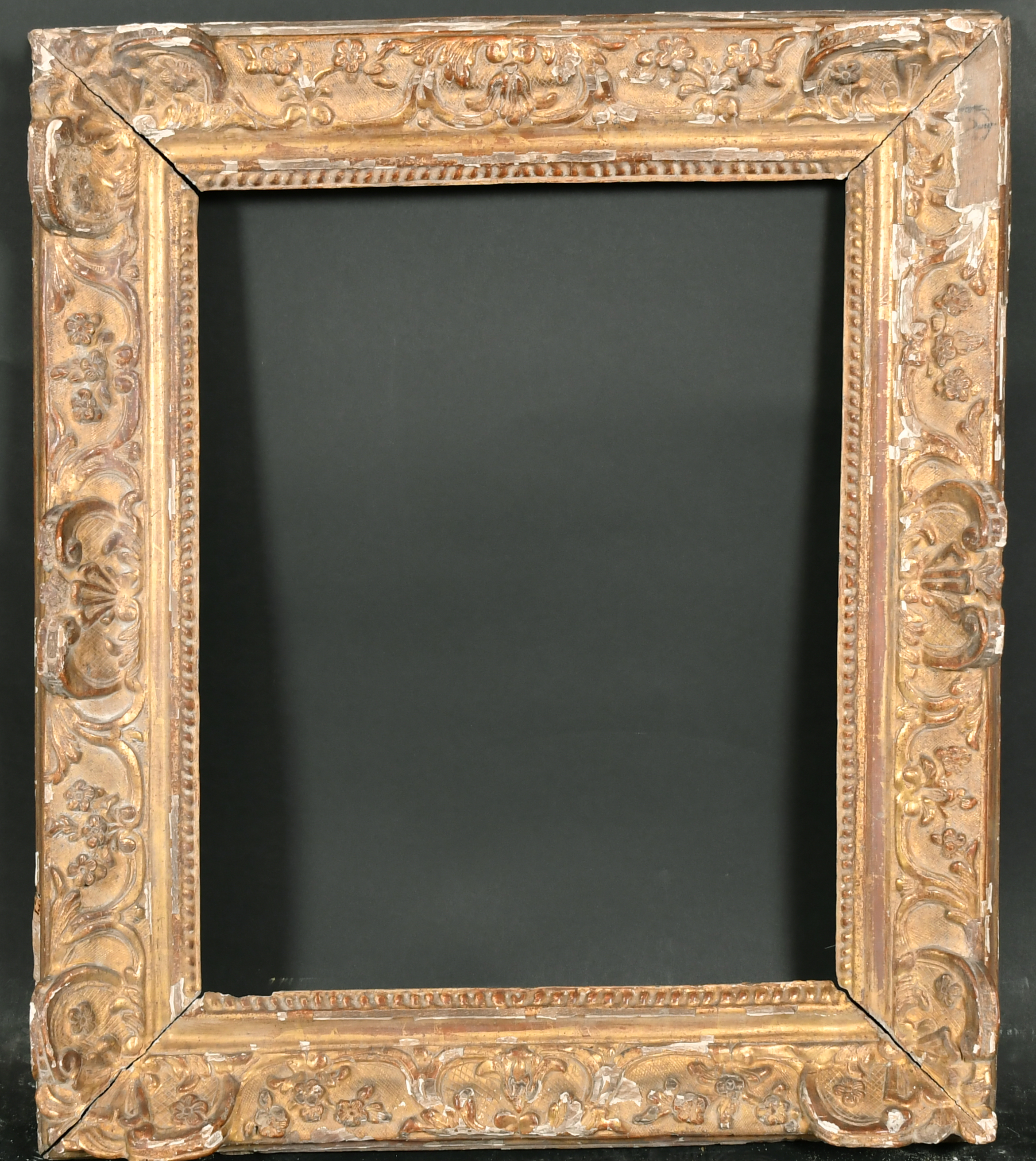 18th Century French School. A Carved Giltwood Louis XIV Giltwood Frame, with swept centres and - Image 2 of 3