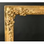 19th Century English School. A Gilt Composition Frame, with floral corners, rebate 40" x 32" (101.