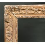 18th Century French School. A Carved Giltwood Louis XIV Giltwood Frame, with swept centres and