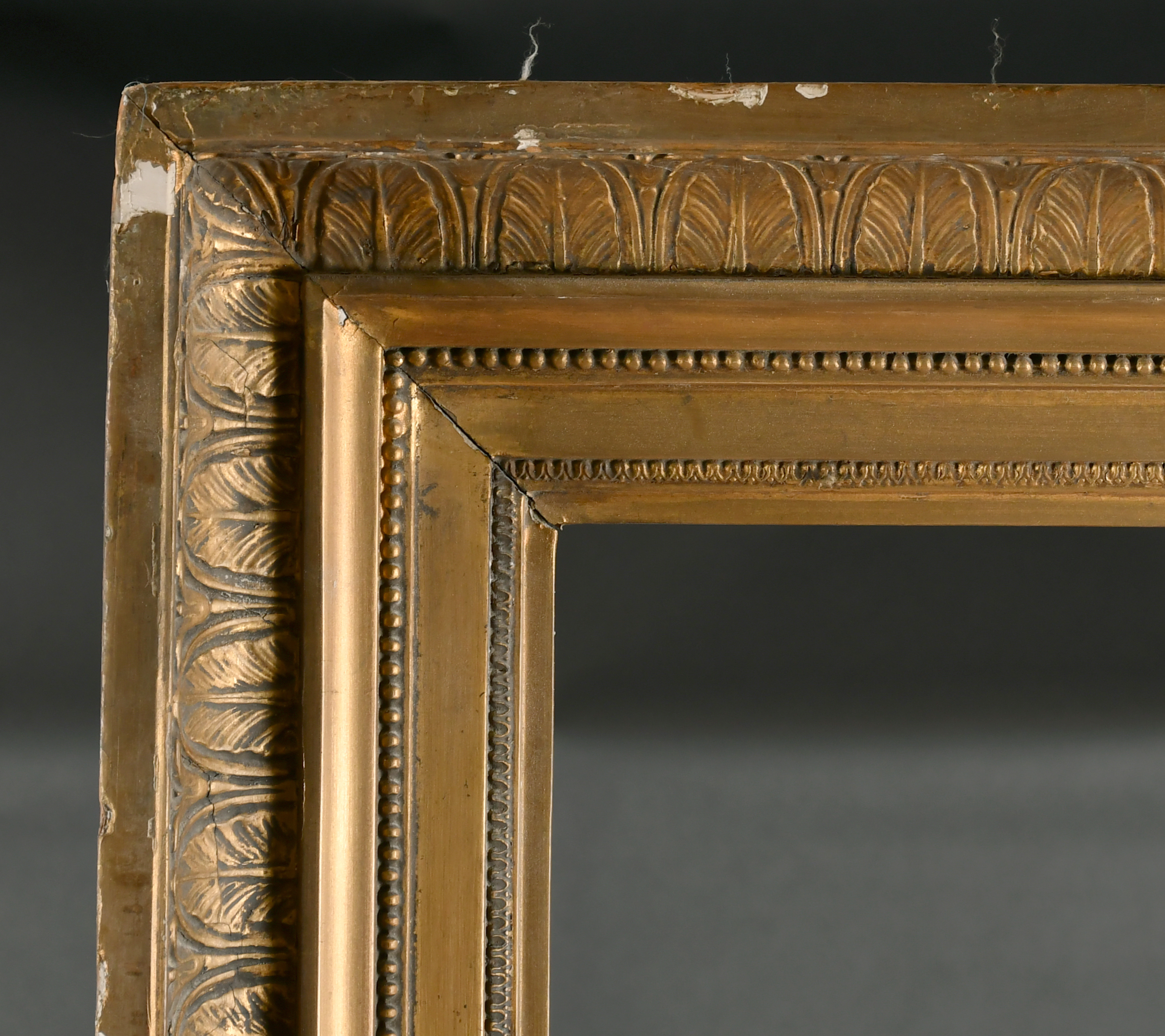 19th Century French School. A Gilt Composition with Acanthus Leaf Hollow Frame, rebate 71" x 58.