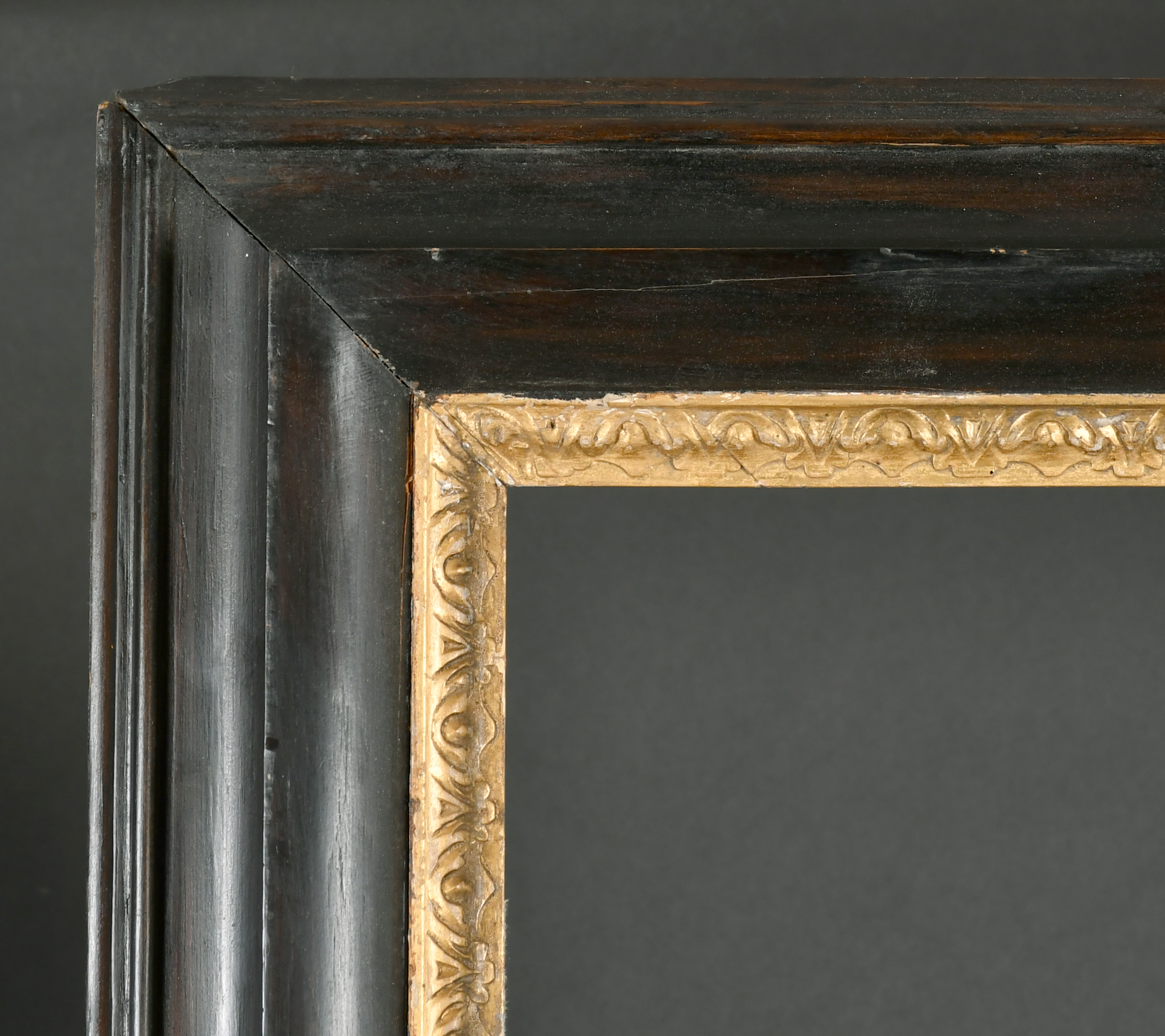 18th Century English School. A Reverse Ebonised Frame, with a carved giltwood sight edge, rebate