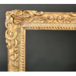 18th Century English School. A Carved Giltwood Frame, with swept and pierced centres and corners,