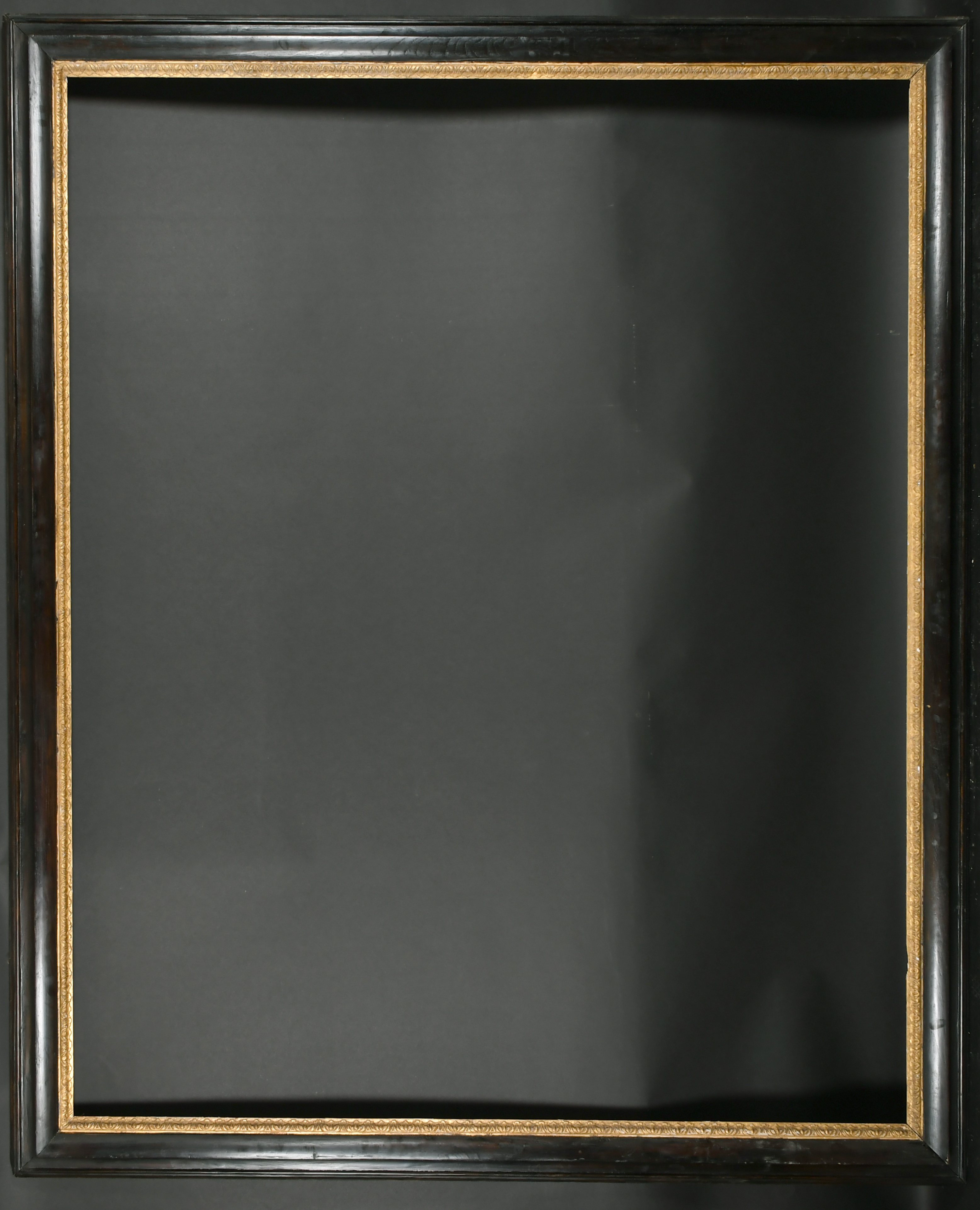 18th Century English School. A Reverse Ebonised Frame, with a carved giltwood sight edge, rebate - Image 2 of 3