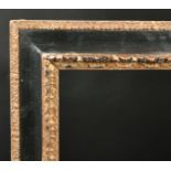 20th Century Spanish School. A Carved Giltwood and Black Reverse Frame, rebate 27" x 19.5" (68.6 x