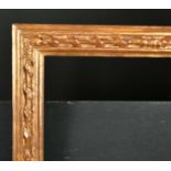 18th Century Italian School. A Carved Giltwood Frame, with pin and ribbon ornament, rebate 21" x
