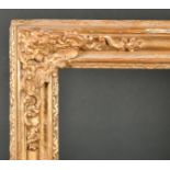 18th Century French School. A Carved Giltwood Frame, rebate 41.5" x 28" (105.4 x 71.1cm)