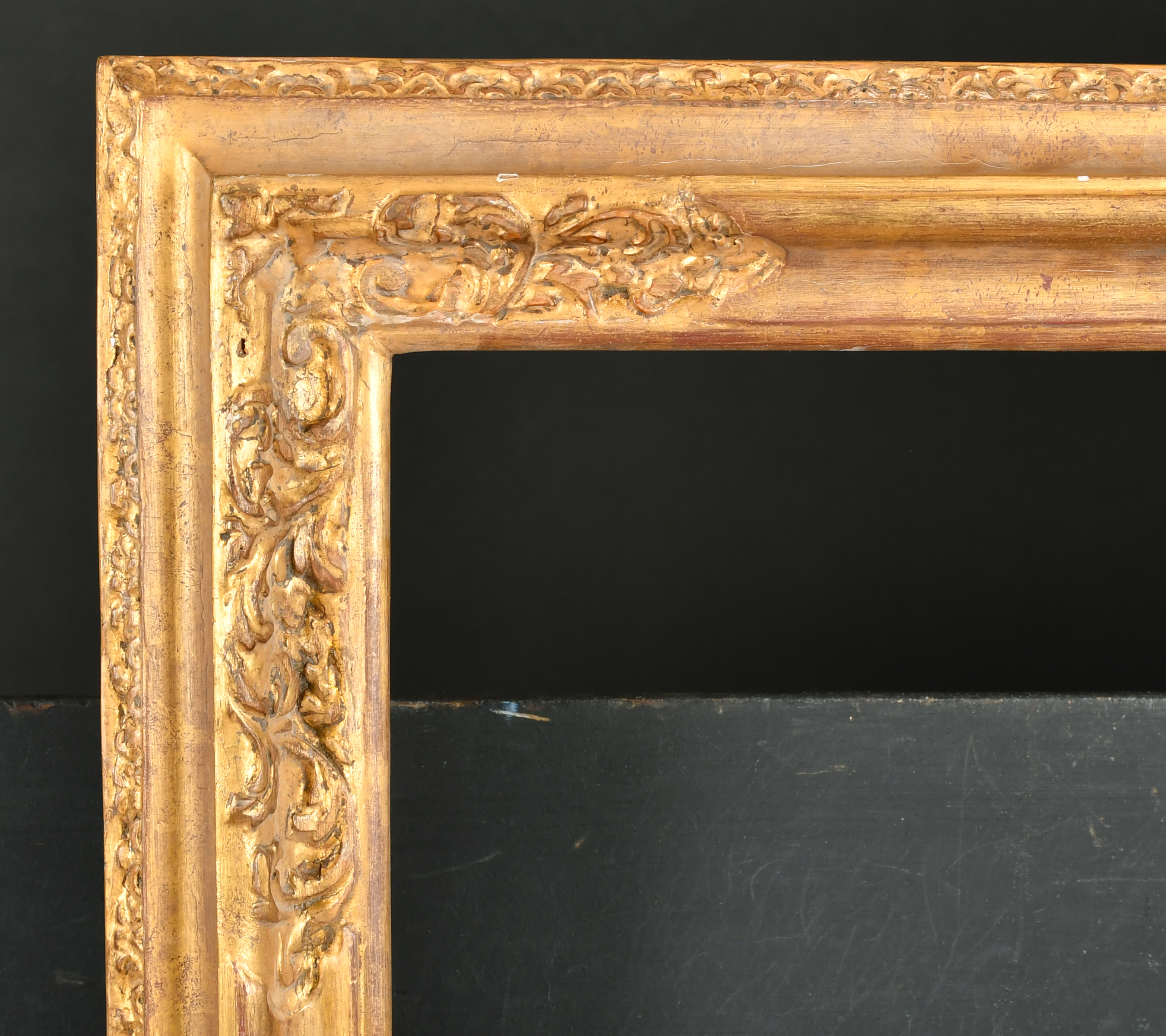 17th Century English School. A Carved Giltwood Lely Panel Reverse Profile Frame, rebate 20.25" x