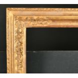 17th Century English School. A Carved Giltwood Lely Panel Reverse Profile Frame, rebate 20.25" x