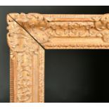 Late 17th Century French School. A Louis XIV Carved Giltwood Frame, with swept centres and