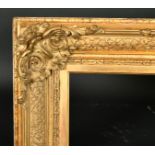 19th Century English School. A Gilt Composition Frame, with swept centres and corners, rebate 36"