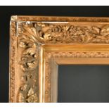19th Century French School. A Gilt and Painted Composition Barbizon Frame, rebate 59.5" x 34.5" (